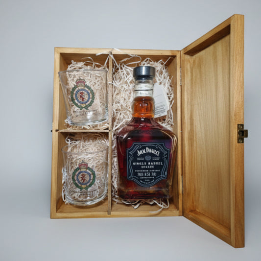 Close-up of personalised whiskey glass from NHS paramedic retirement gift set showing custom engraved design