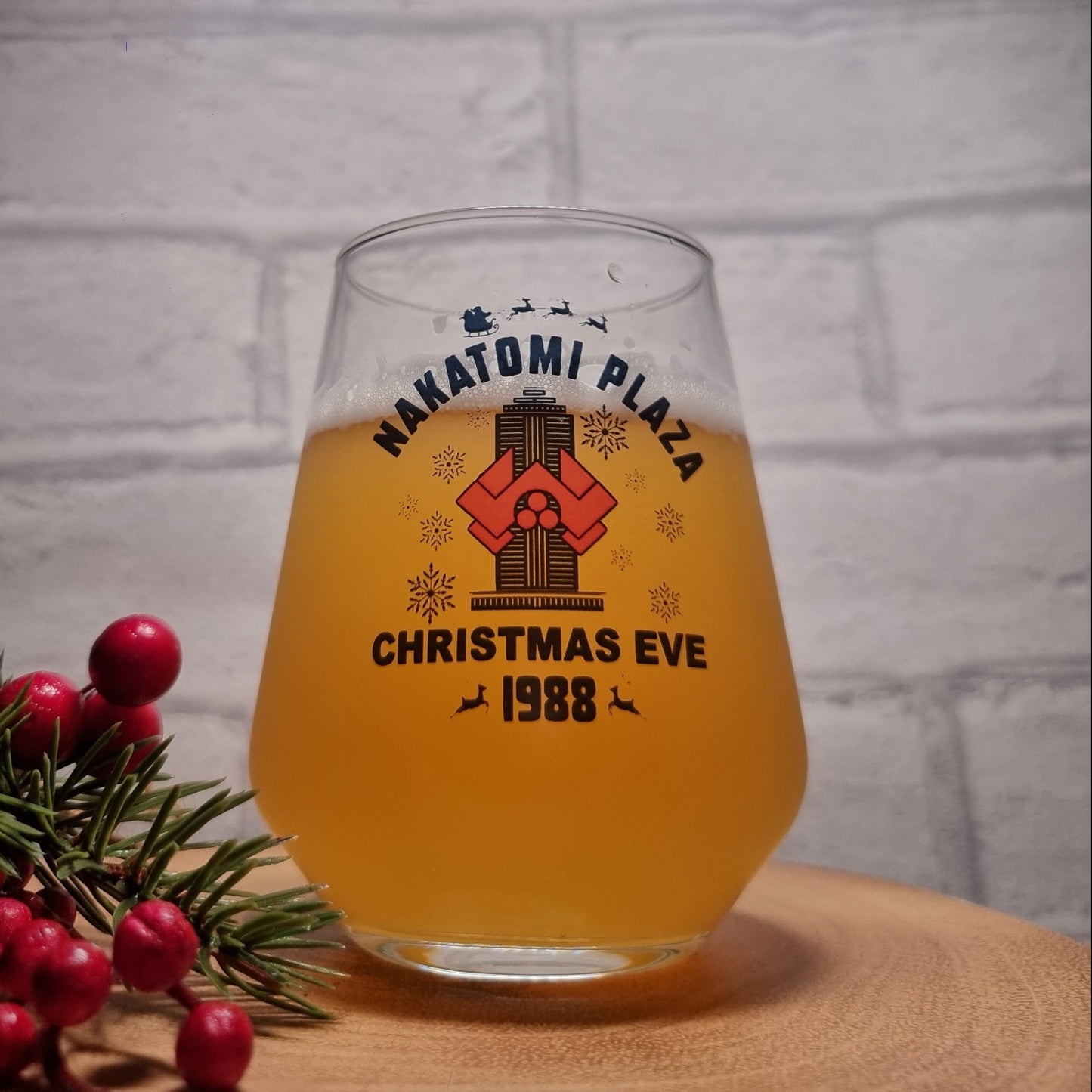 Nakatomi Plaza Christmas Eve 1988 beer glass — front design detail showing building illustration