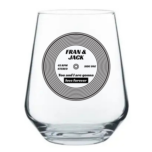 Personalised vinyl record beer glass with couple names and song title printed on the design