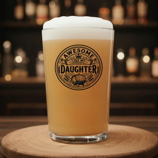 Pint of beer with 'Awesome Like My Daughter' logo on a wooden coaster.