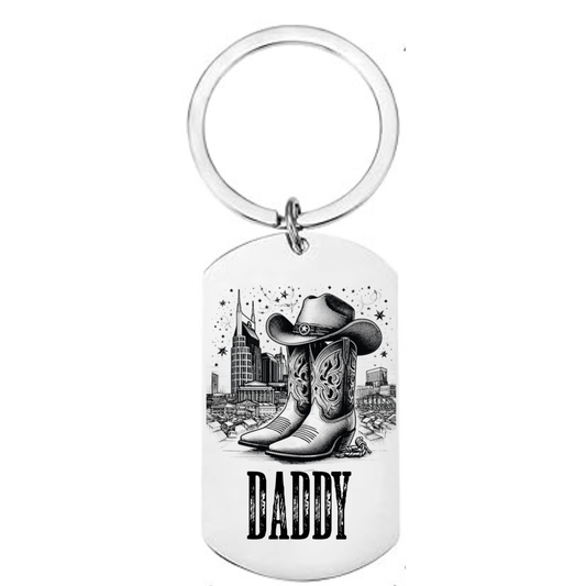 Personalised laser engraved country music dog tag keyring front showing cowboy boots and hat design