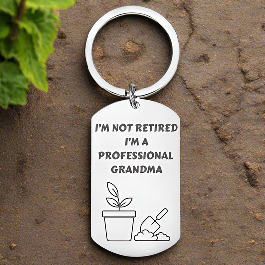 Personalised Engraved Grandad/Grandma Keyring – "I'm Not Retired, I'm a Professional Grandad/Grandma" with Gardening Design (