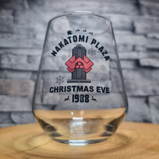 Nakatomi Plaza Christmas Eve 1988 beer glass — original artwork tribute design for action movie fans. Toughened glass, printed in the UK. The perfect Christmas gift