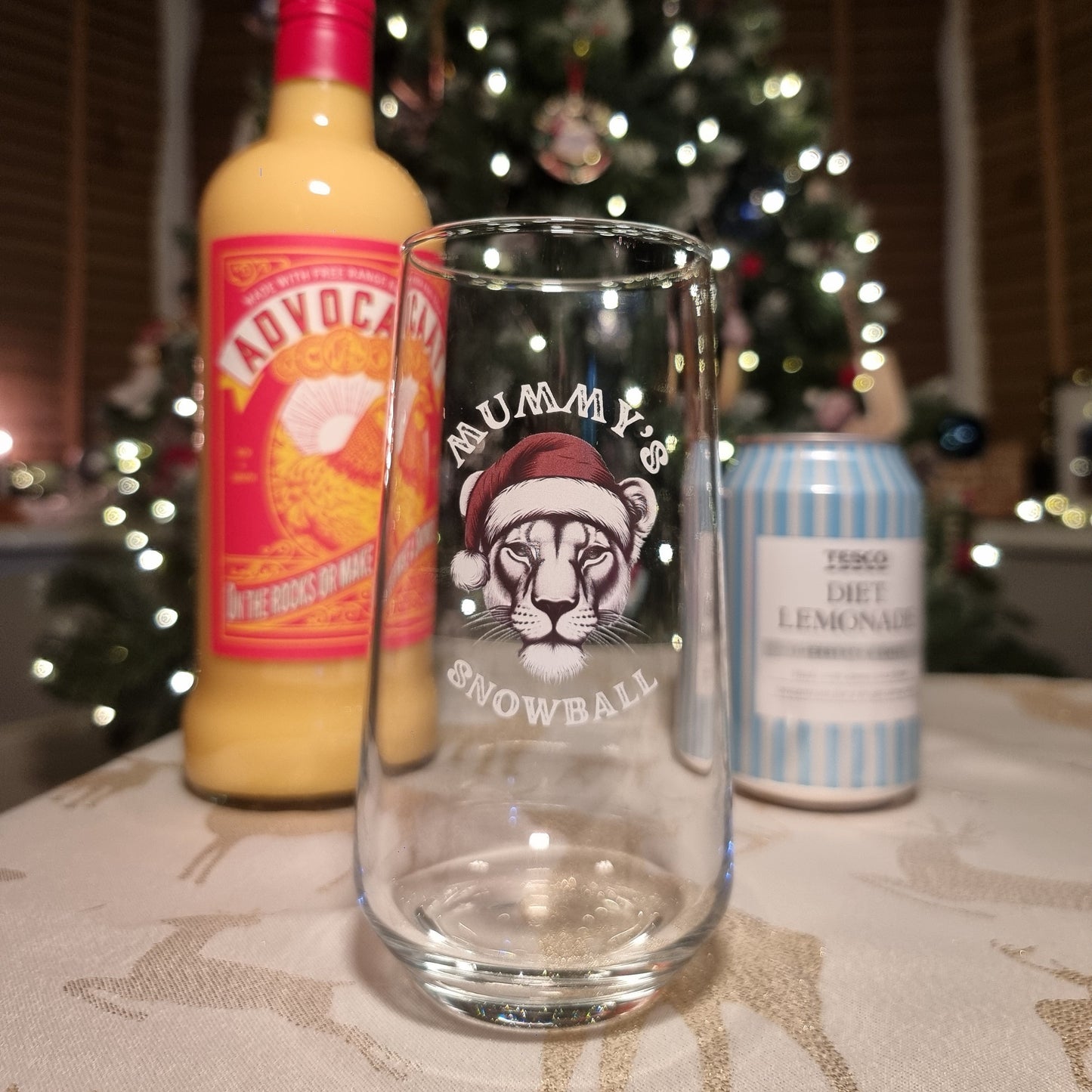 Personalised pint glass printed with a female lioness in a Santa hat and the text Daddy's Beer — custom Christmas glassware by First Class Design