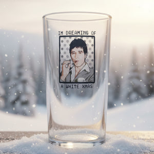 Scarface beer glass — close-up of Tony Montana illustrated portrait with snowflakes
