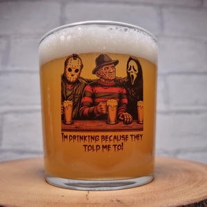 Horror icons beer glass — close-up of illustrated design detail