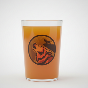 A clear pint glass filled with amber beer, featuring a circular graphic of a howling wolf in red, orange, and black, set against a clean light gray background.
