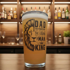 Personalised King of Beers pint glass for dad with lion graphic and text The Provider The Legend The Man The King — printed conical beer glass gift UK by First Class Designs