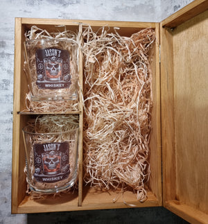 Personalised whiskey box gift set showing engraved wooden lid and two custom Tubo glasses nestled in straw
