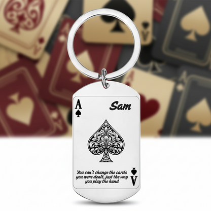 Keychain with Ace of Spades design and 'Sam' text on a white background