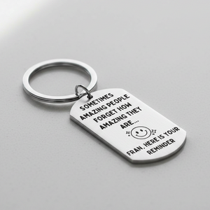 Close-up of engraved amazing people keychain gift for colleague friend teacher mentor women men UK
