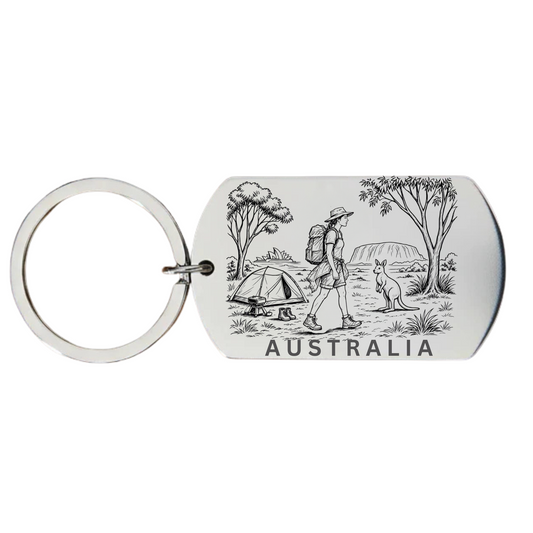 Australia backpacker keyring laser engraved stainless steel dog 
tag with female backpacker kangaroo and Australian outback scene 
on white background
