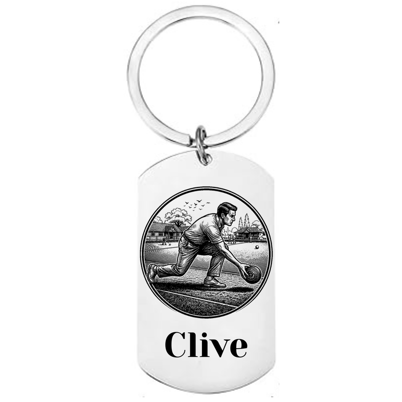 Personalised lawn bowls keyring laser engraved stainless steel dog tag with male bowls player delivery scene in circular medallion design and personalised name on white background