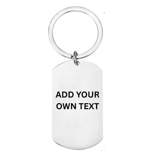 Reverse of personalised Cornwall stainless steel dog tag keyring showing laser engraved text personalisation area on white background