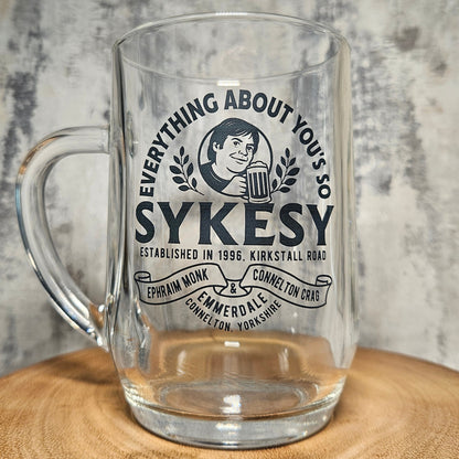 Personalised 1-pint tankard held in hand showing scale and handle grip