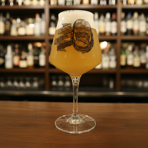 Give in to Beer Pressure gorilla beer glass custom printed with 
bold gorilla in military hat illustration on a bar counter with spirit bottles in the background
