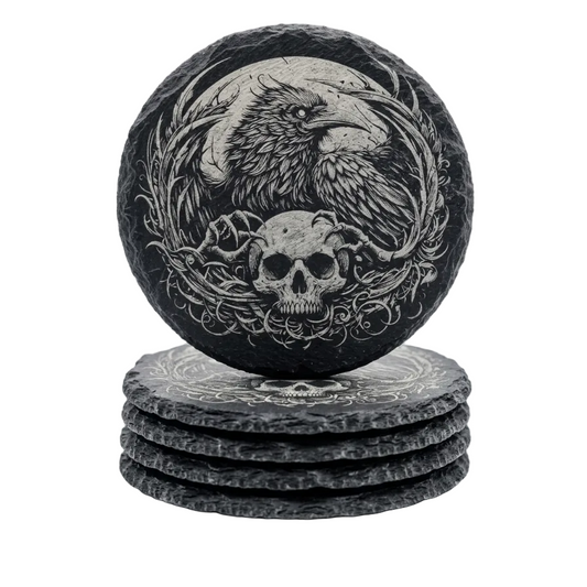 Gothic laser engraved slate coaster set featuring detailed raven and skull design stacked on white background, unique dark gothic gift