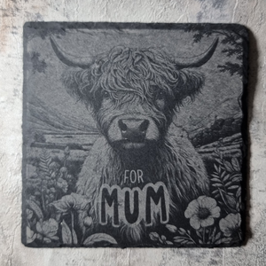 Personalised slate or bamboo coaster engraved with a detailed Highland cow illustration and the text “For Mum,” featuring its iconic long horns and shaggy coat, rustic and charming design, perfect as a countryside-themed or wildlife-inspired gift for mothers.