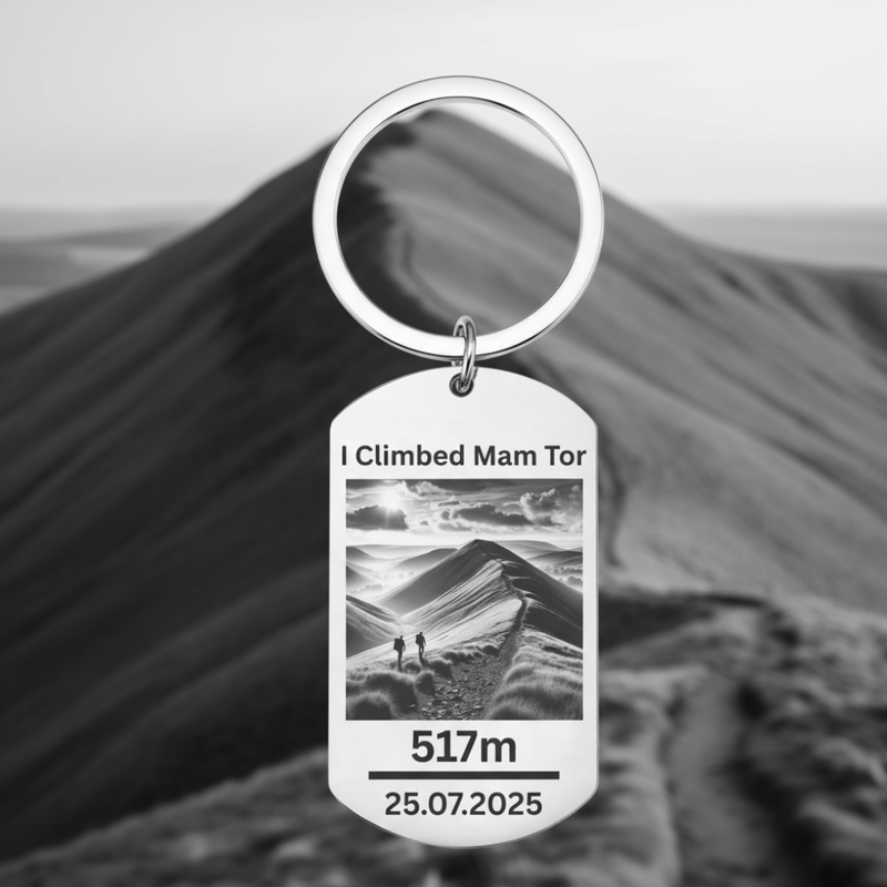 Engraved metal keyring with the text “I Climbed Mam Tor” – Peak District hiking souvenir and gift for walkers and adventurers.