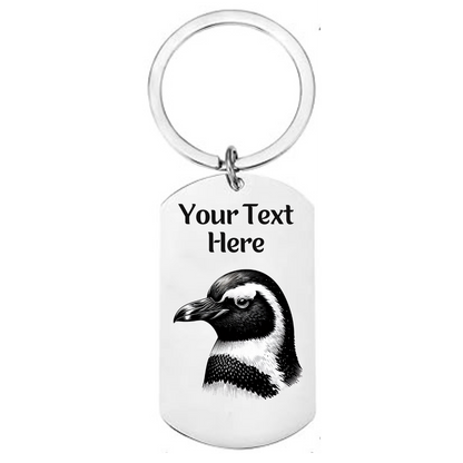 Keychain with penguin design and customizable text on a white background