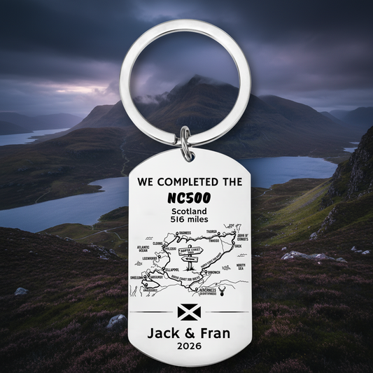 Personalised NC500 laser engraved stainless steel dog tag keyring showing North Coast 500 route map with custom name Jack and Fran and year 2026