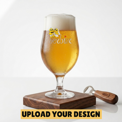 Personalised 370ml stemmed tulip beer glass with custom uploaded wedding bee oerbier design filled with golden beer on wooden coaster