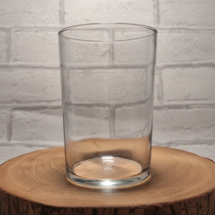 Personalised 51cl Tubo tumbler glass with custom printed design — large rocks glass shape with thick base, shown in use