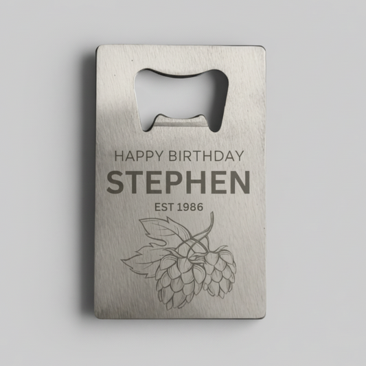Personalised stainless steel credit card bottle opener laser engraved with name, birth year and hop cluster design