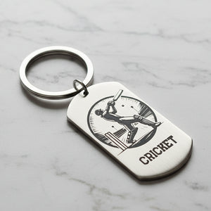 Keychain with cricket design and 'CRICKET' text on a stainless steel keyring