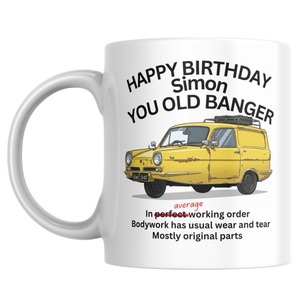 Personalised You Old Banger birthday mug ink printed with 
three-wheeled van illustration and humorous MOT-style description 
personalised with name