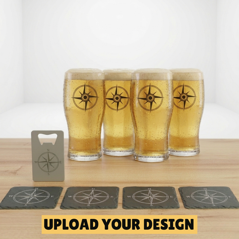 Personalised home bar bundle showing 4 custom printed pint glasses, 4 laser engraved slate coasters and laser engraved bar blade with matching compass design