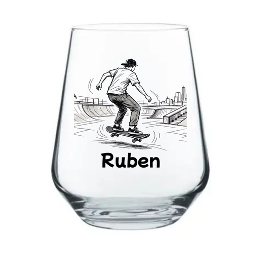 Personalised skateboarding stemless beer glass custom printed 
with dynamic skateboarder on ramp illustration and personalised 
name below on white background