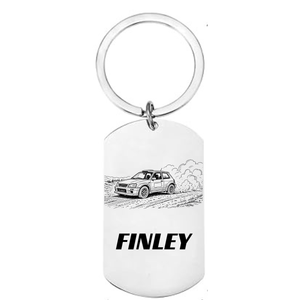 Personalised rally car laser engraved stainless steel dog tag 
keyring with classic hatchback dirt stage illustration and 
personalised name on white background