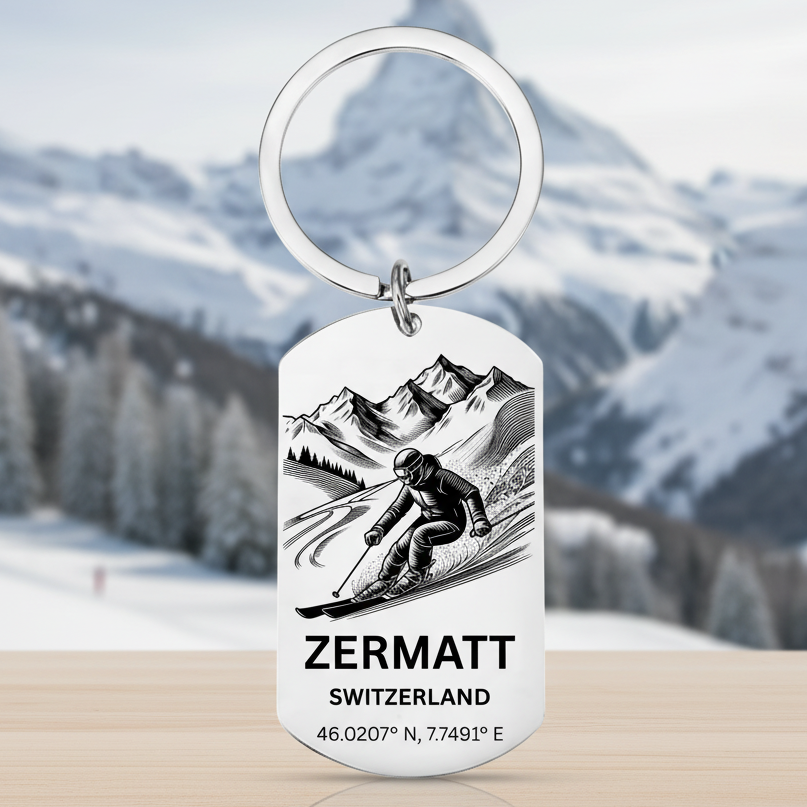 Keychain with a skier design and 'Zermatt Switzerland' text on a white background