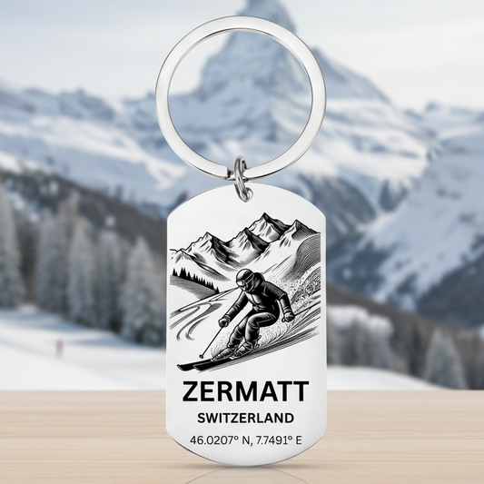 Keychain with a skier design and 'Zermatt Switzerland' text on a white background