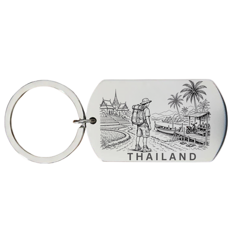 Thailand backpacker keyring laser engraved stainless steel dog tag with male backpacker temple palm trees and long-tail boat scene on white background