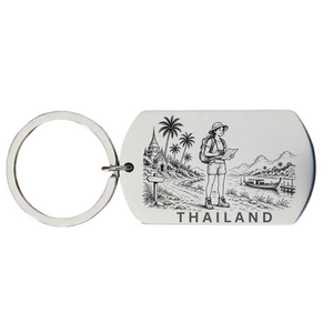 Thailand backpacker keyring laser engraved stainless steel dog tag with female backpacker temple and tropical scene on white background