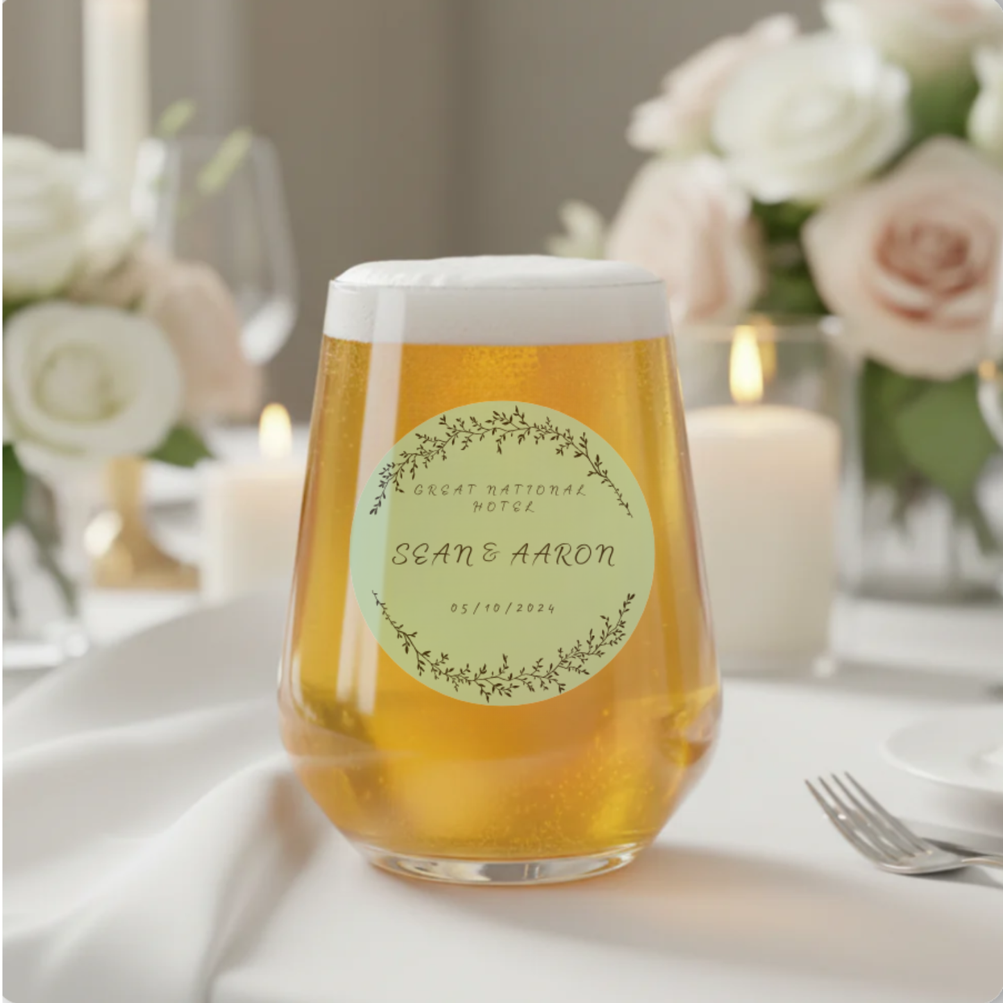 Personalised wedding tumbler glass with botanical circle design — printed with couple's names and wedding date by First Glass Designs