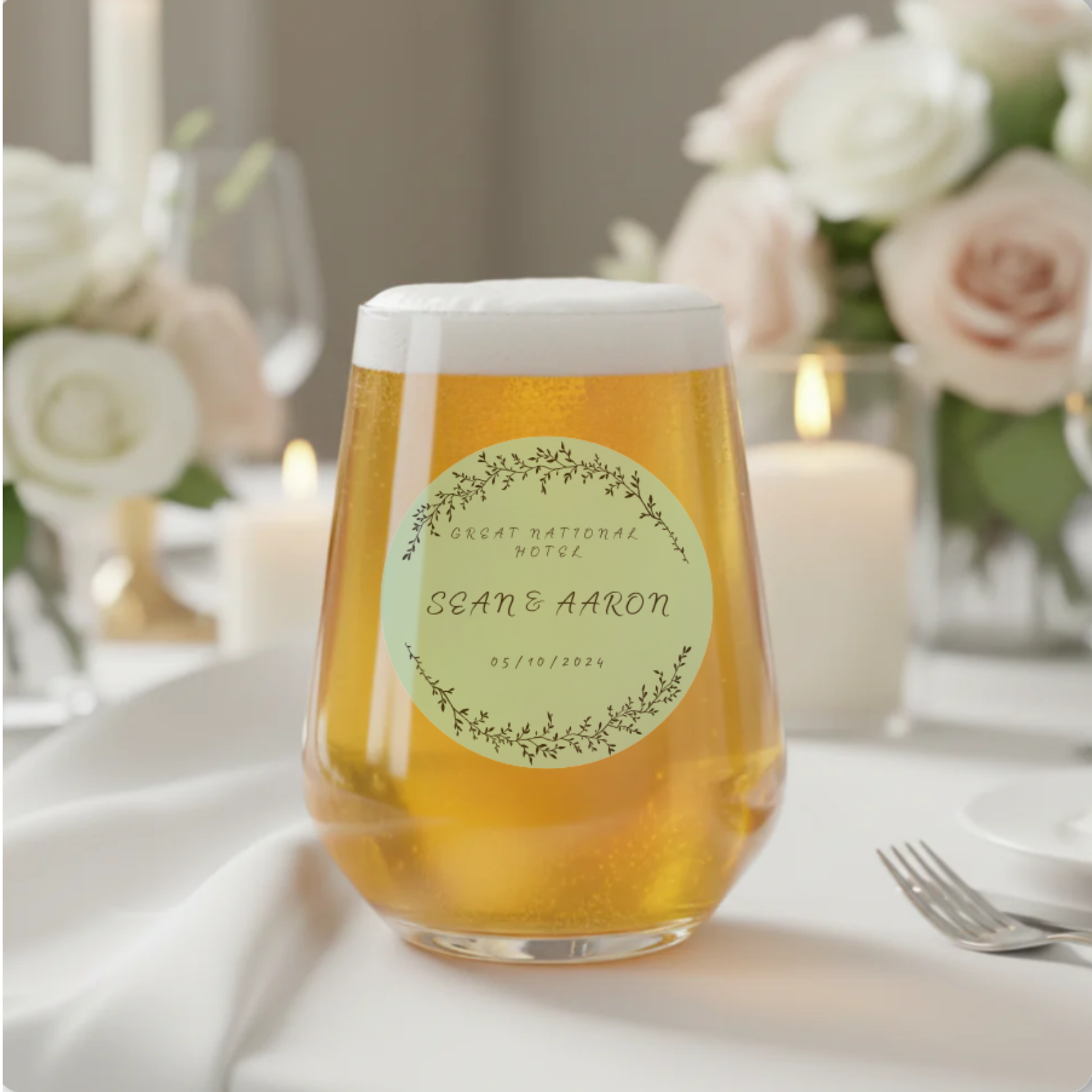 Personalised wedding tumbler glass with botanical circle design — printed with couple's names and wedding date by First Glass Designs