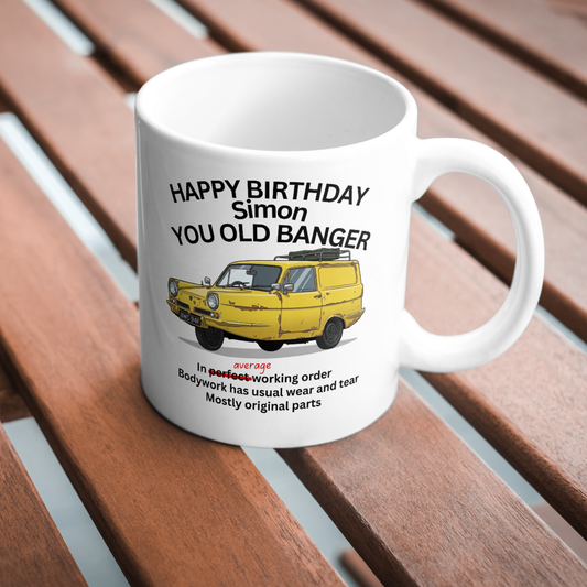 You Old Banger personalised funny birthday mug showing ink 
printed design from left side angle on black background
