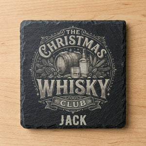 Laser engraved slate coaster featuring a festive whisky design with personalised name banner