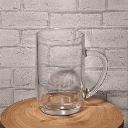 Side view of 1-pint glass beer tankard with printed personalised design and handle