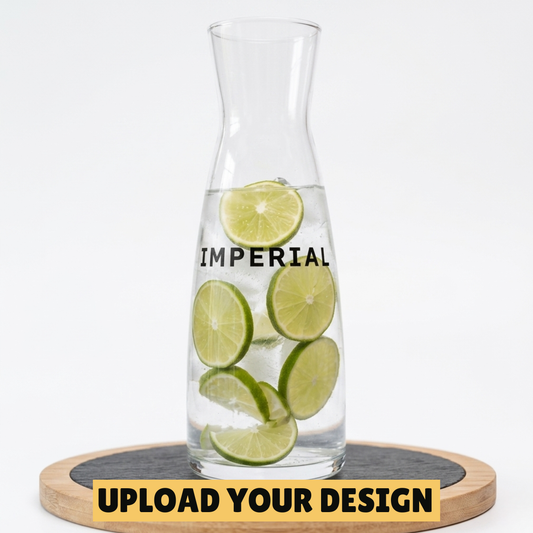 personalised glass carafe with custom printed Imperial design filled with water and limes on wooden board, unique gift
