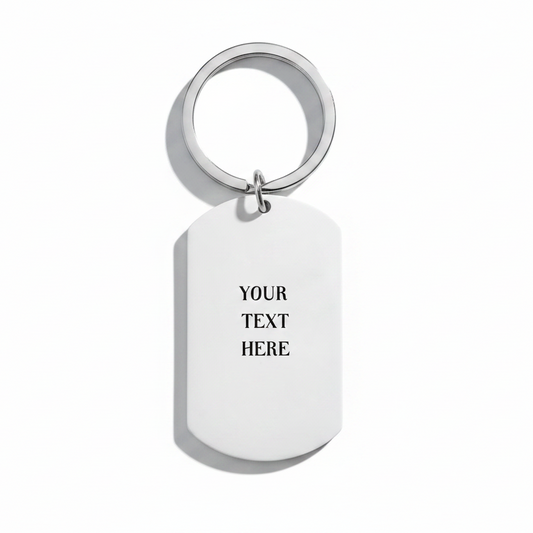 Blank white keychain with 'Your Text Here' text on a white background